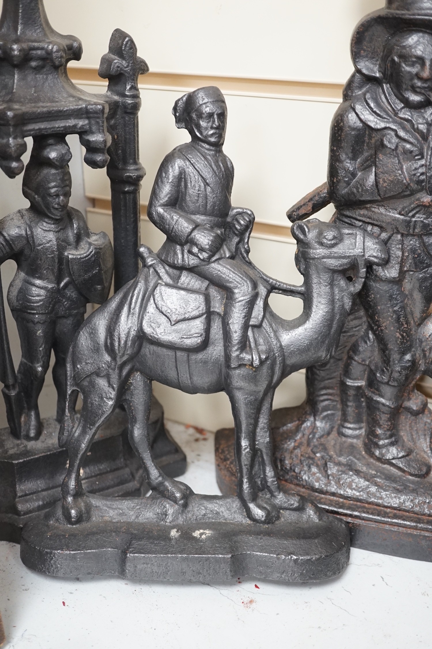 Three Victorian cast iron figural doorstops, 40cm